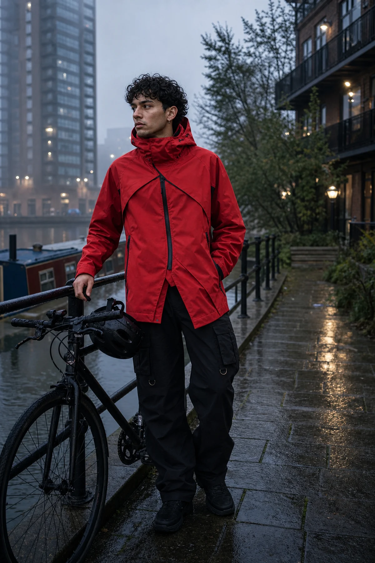Editorial London canal styling image showing a model wearing the Clothixpack CXP-J102 Axis Hardshell Jacket.